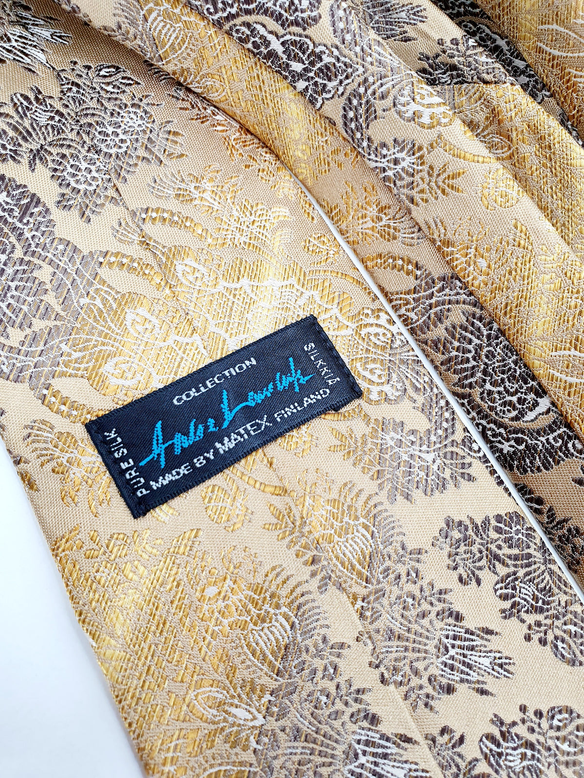 Matex, kullansävyinen vintage silkkikravatti, kuva tuotelogosta