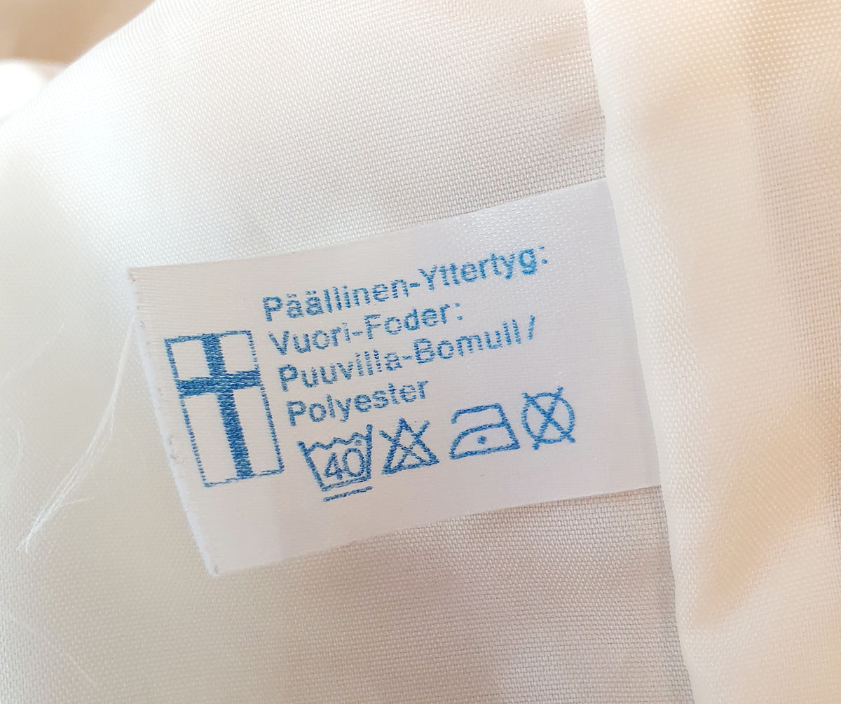 Puolipitkä välikausitakki 90-luvulta, väri vaaleanbeige, kuva tuotelapusta